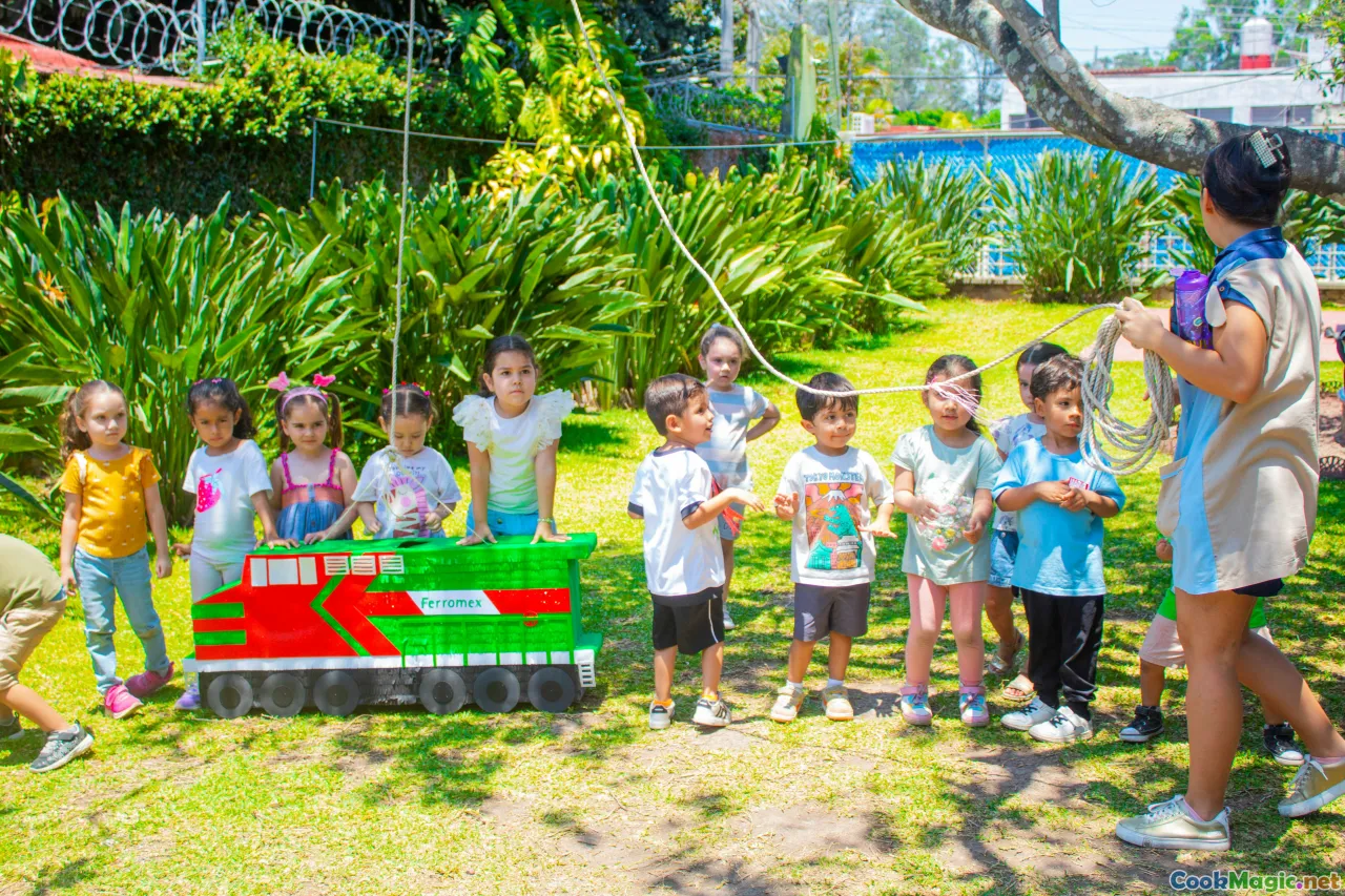 children enjoying party, decorated Australia day cupcake, kids at birthday party, cultural celebration, Australia flag, balloons
