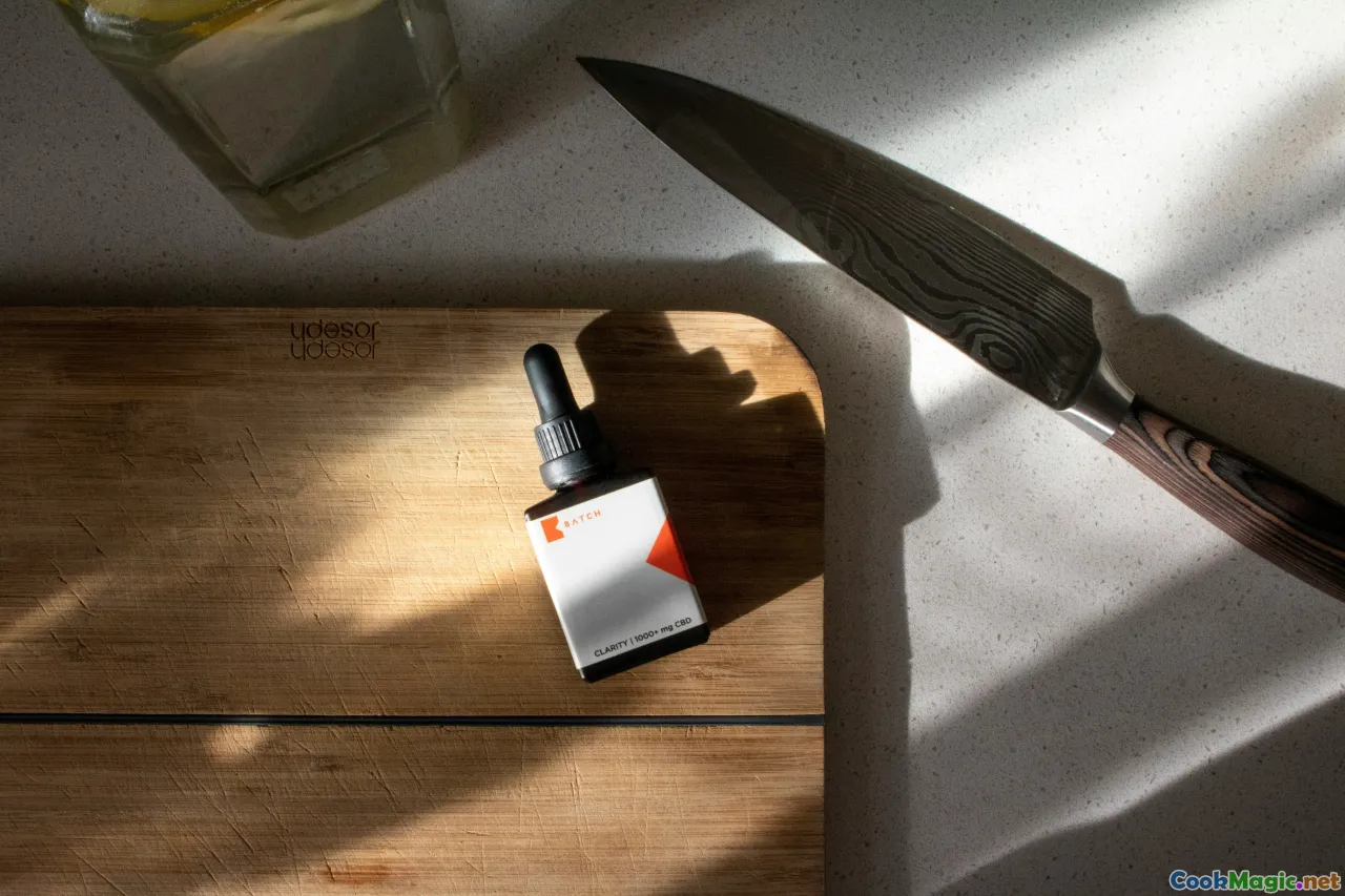 cutting board, knife, olive oil, cast iron