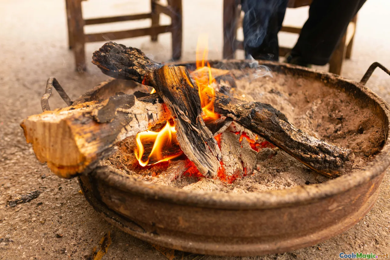 Cypriot dish, cultural celebration, outdoor grilling, traditional tools
