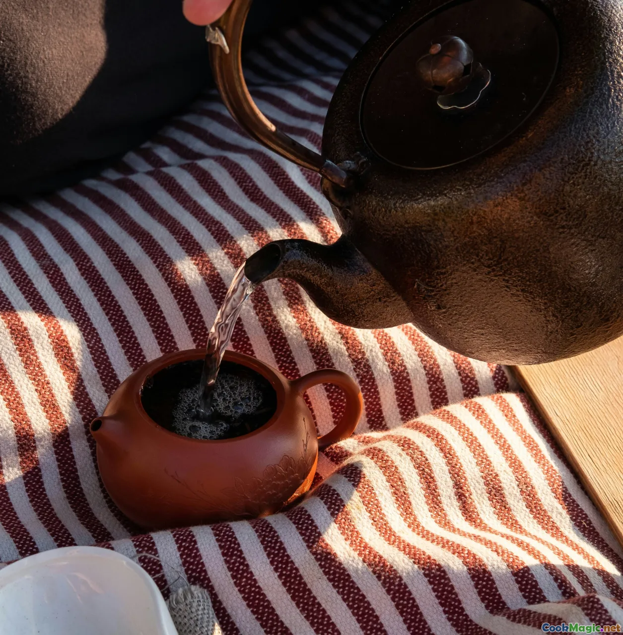 injera cooking, clay griddle, batter pouring