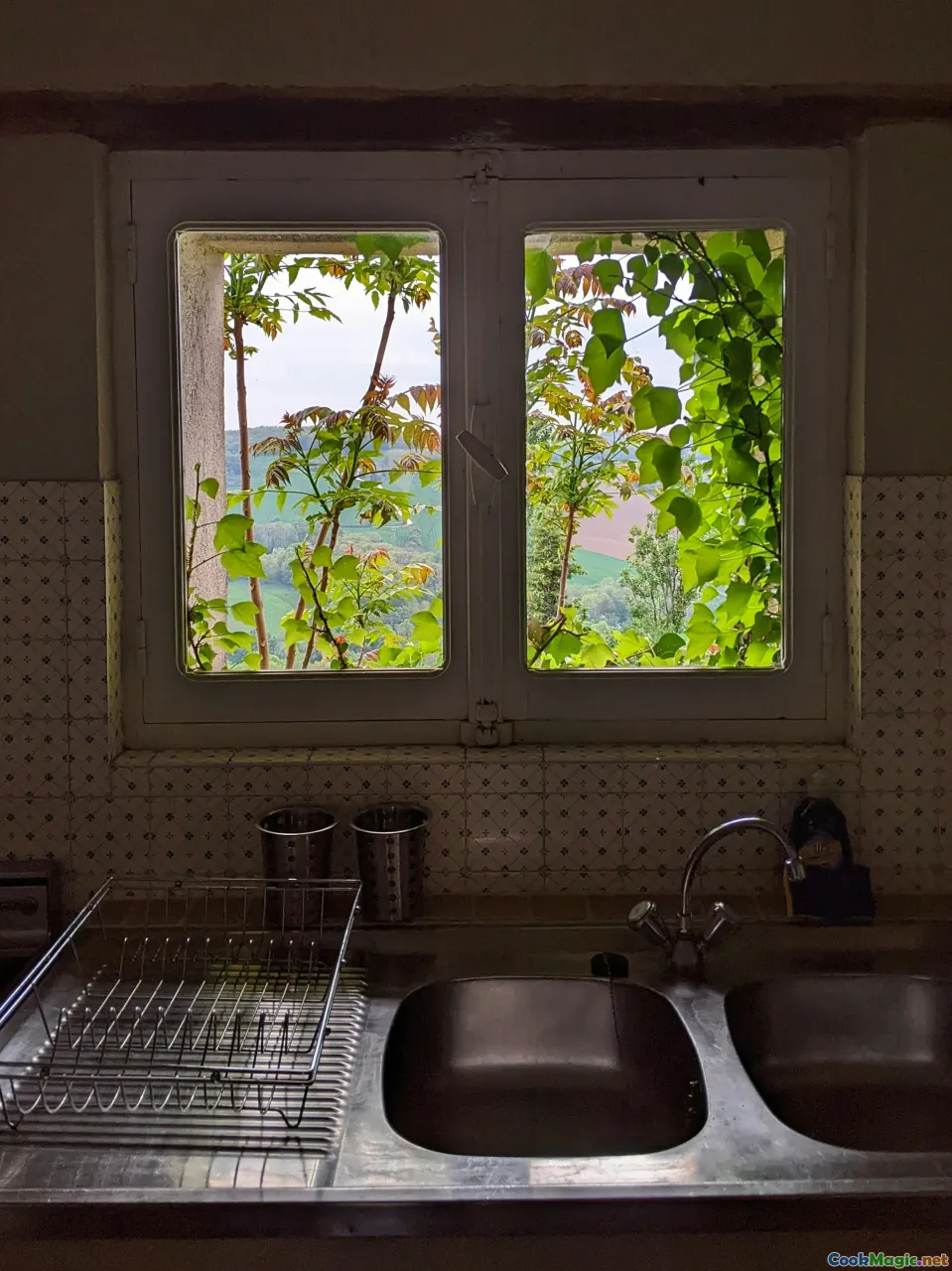 kitchen window, slice on plate, castle view, cozy scene