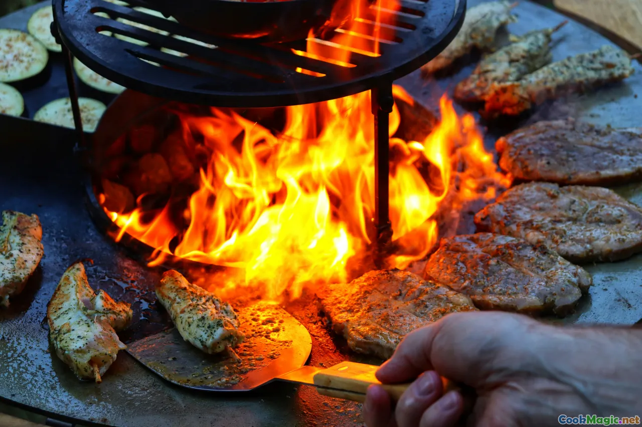 open fire roasting, outdoor cooking, old-fashioned spit