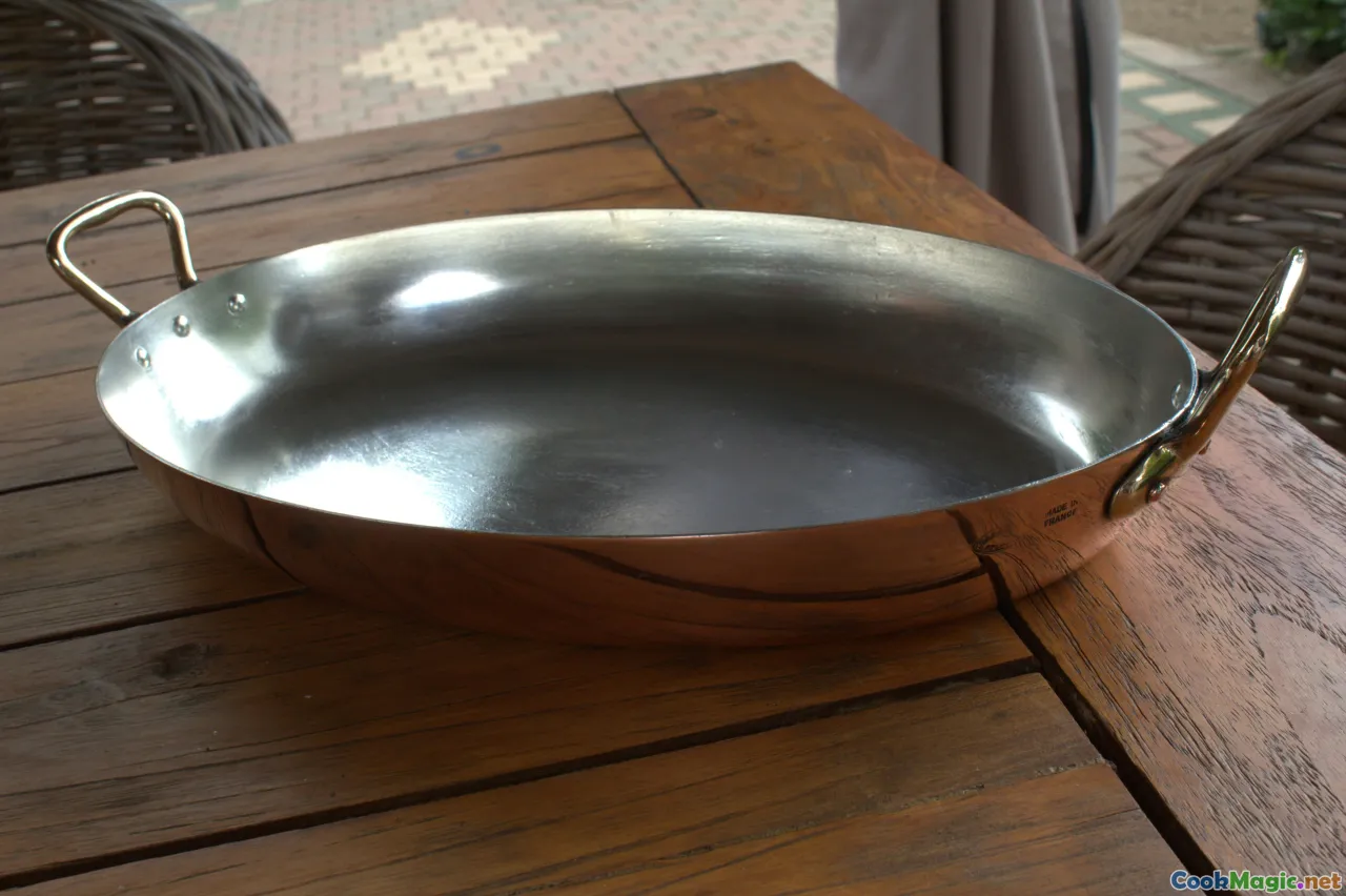 potlikker bowl, cornbread, ladle, rustic table