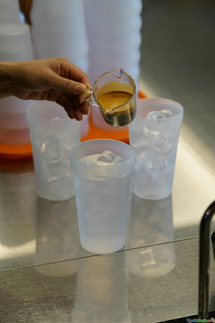 recipe card, measuring cups, pot, bottled syrup