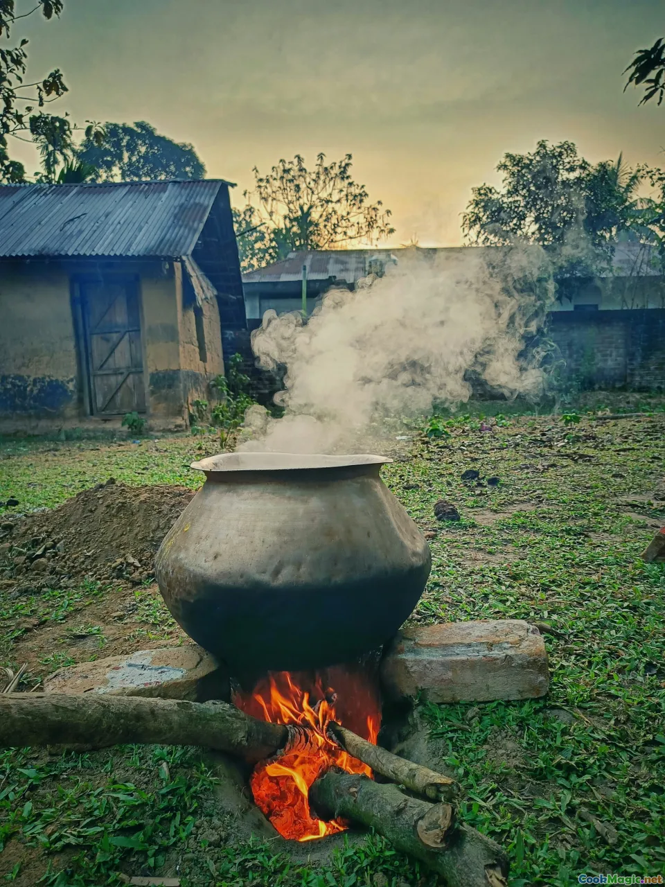 remote village, indigenous cuisine, open fire cooking, traditional clay pot, savanna landscape