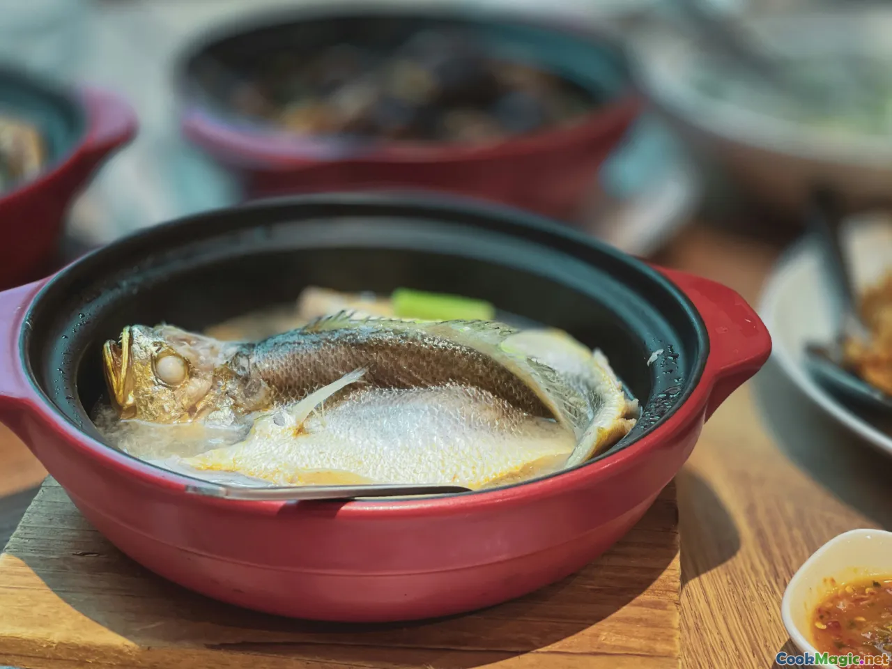 rømmegrøt pot, finnbiff bowl, fiskegrateng dish, rustic kitchen