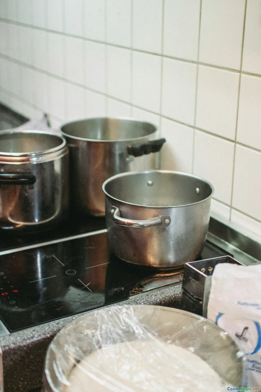 simmering stock, kitchen stove, bubbling pot