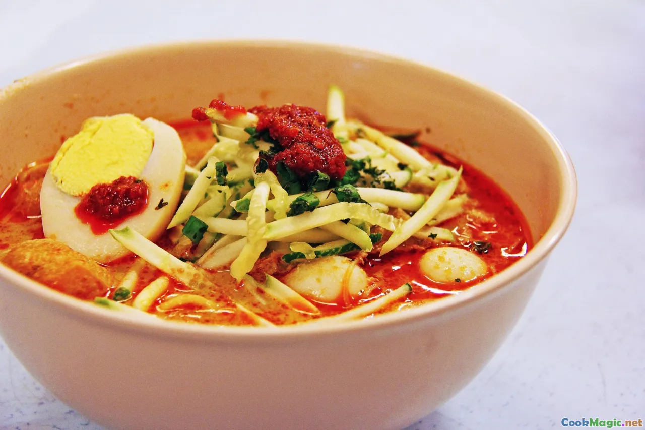 laksa, spicy soup, herbs, seafood