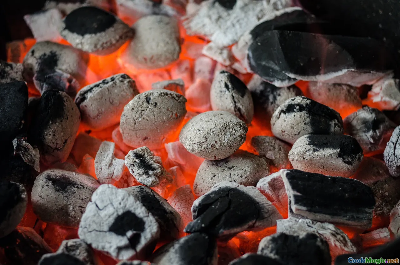 outdoor spit roasting, charcoal grill, roasting lamb outdoors