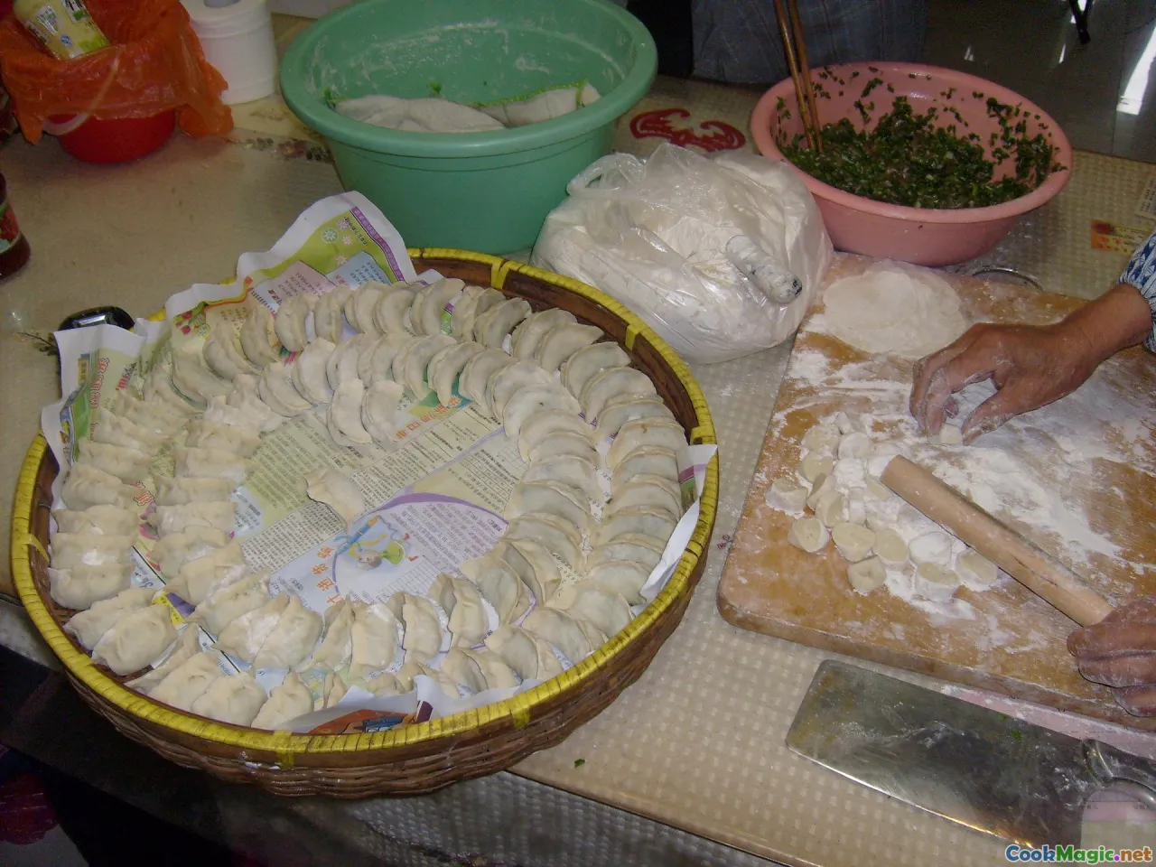 preparing dough, assembling dumplings, cooking ashak