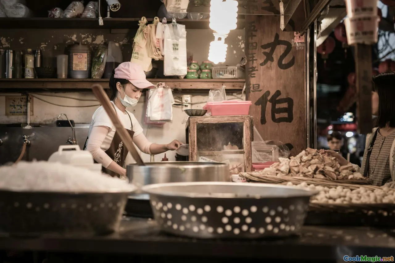 chef preparing fish, traditional kitchen, local spices