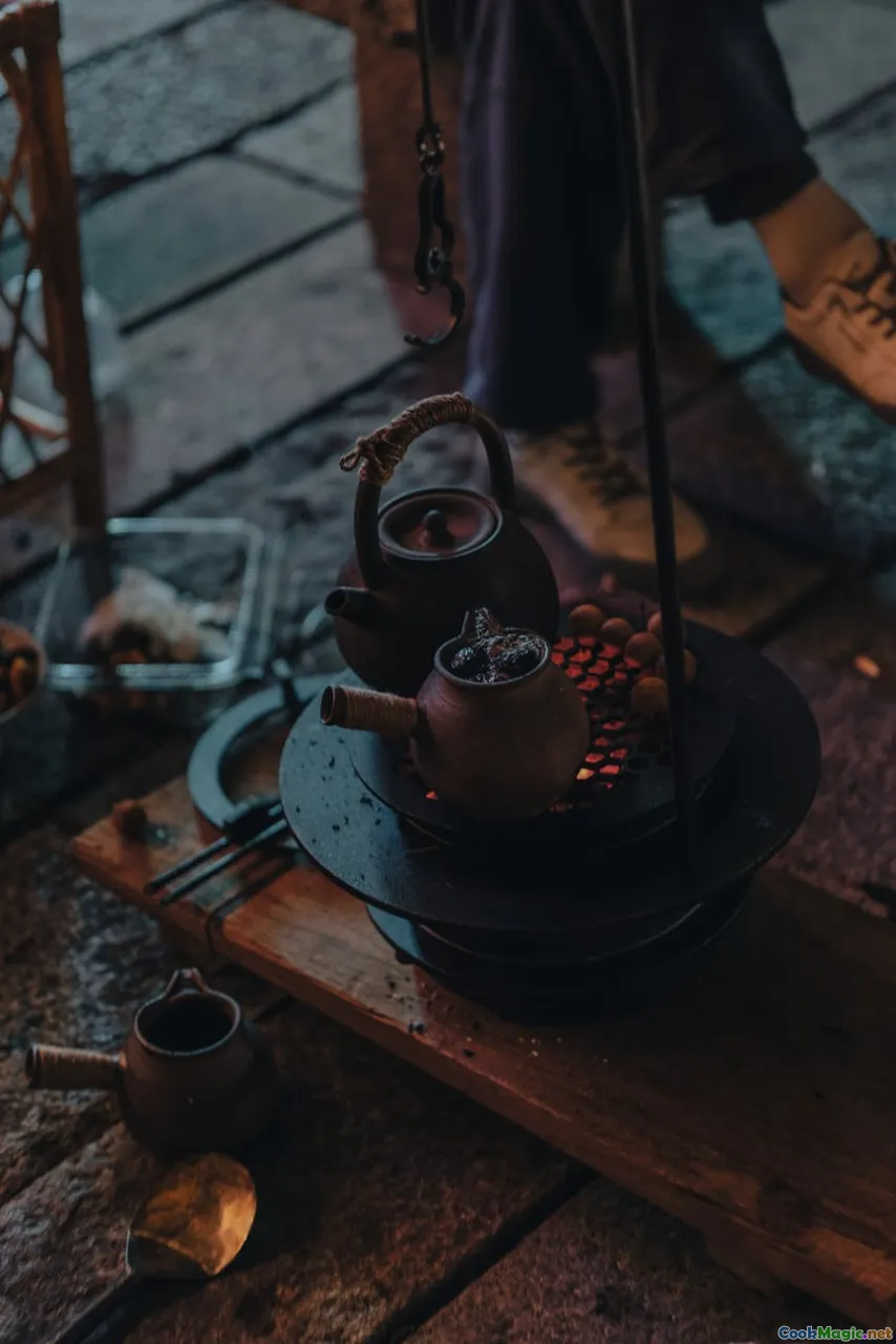 kuali, clay pot, wooden spatula, stove