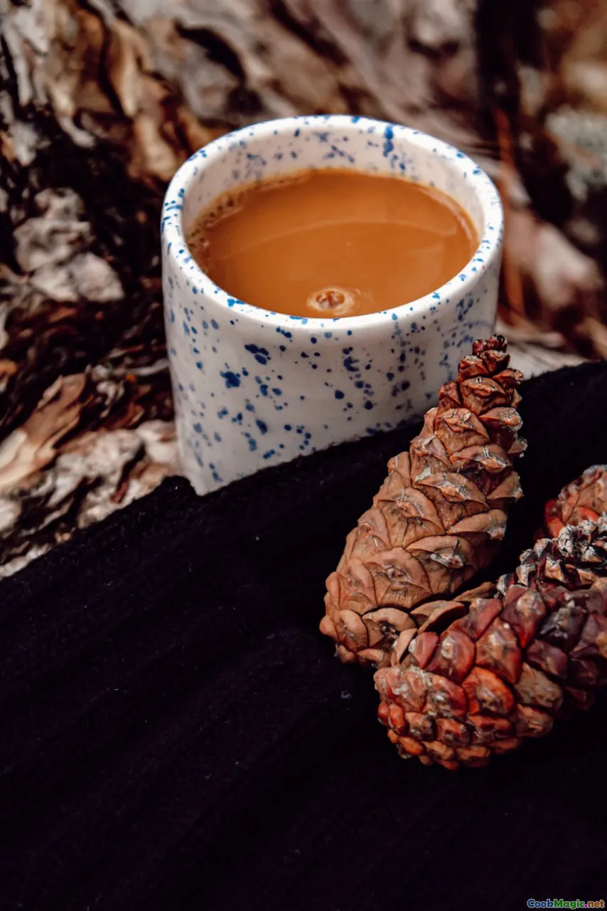 mauby bark, spices, Caribbean drink, rustic cup