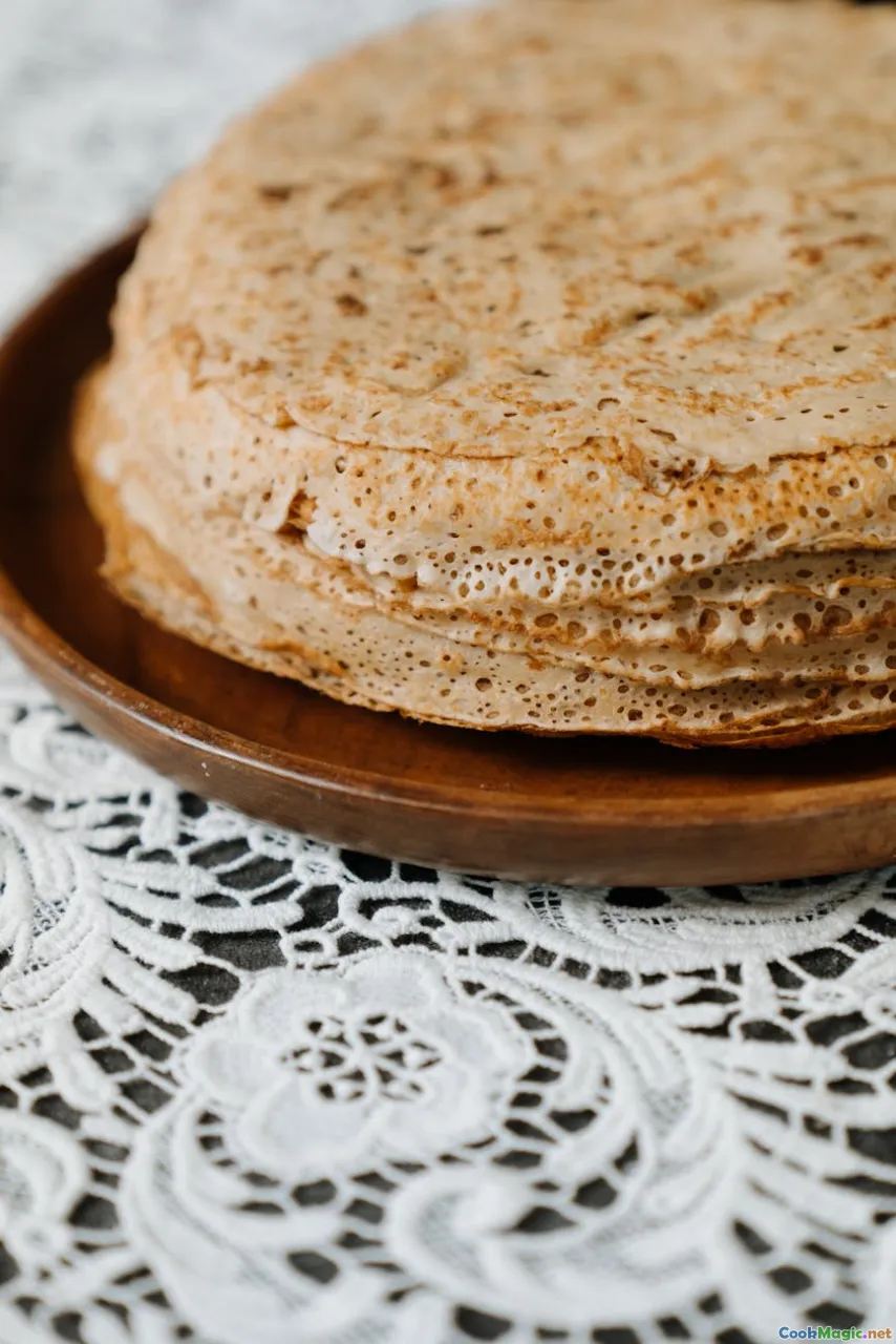 Qurutob, layered dish, flatbread with toppings