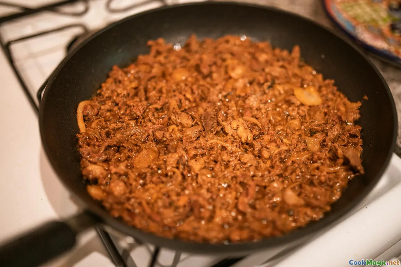 sautéed onions, beef pino, paprika, skillet