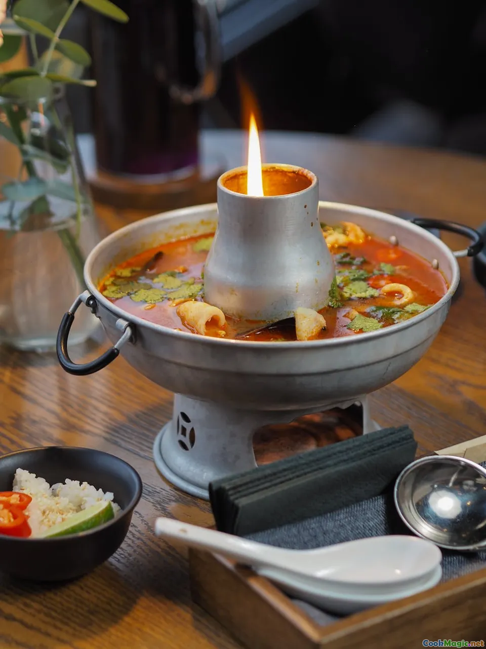 simmering seafood broth, spicy seafood stew, aromatic herbs with seafood