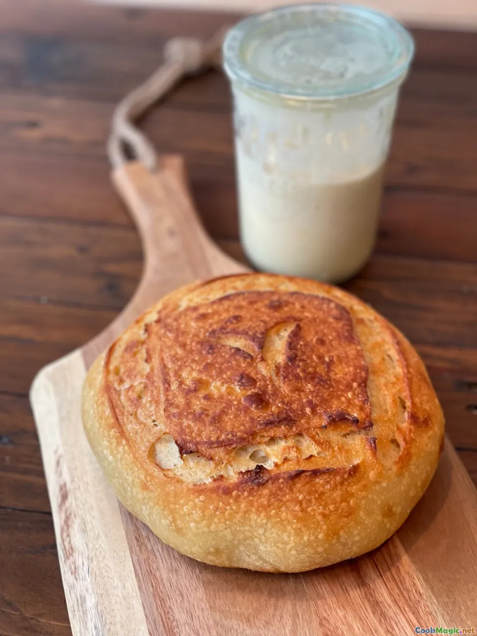 sourdough starter, fermentation jar, artisan bakery, rye grains